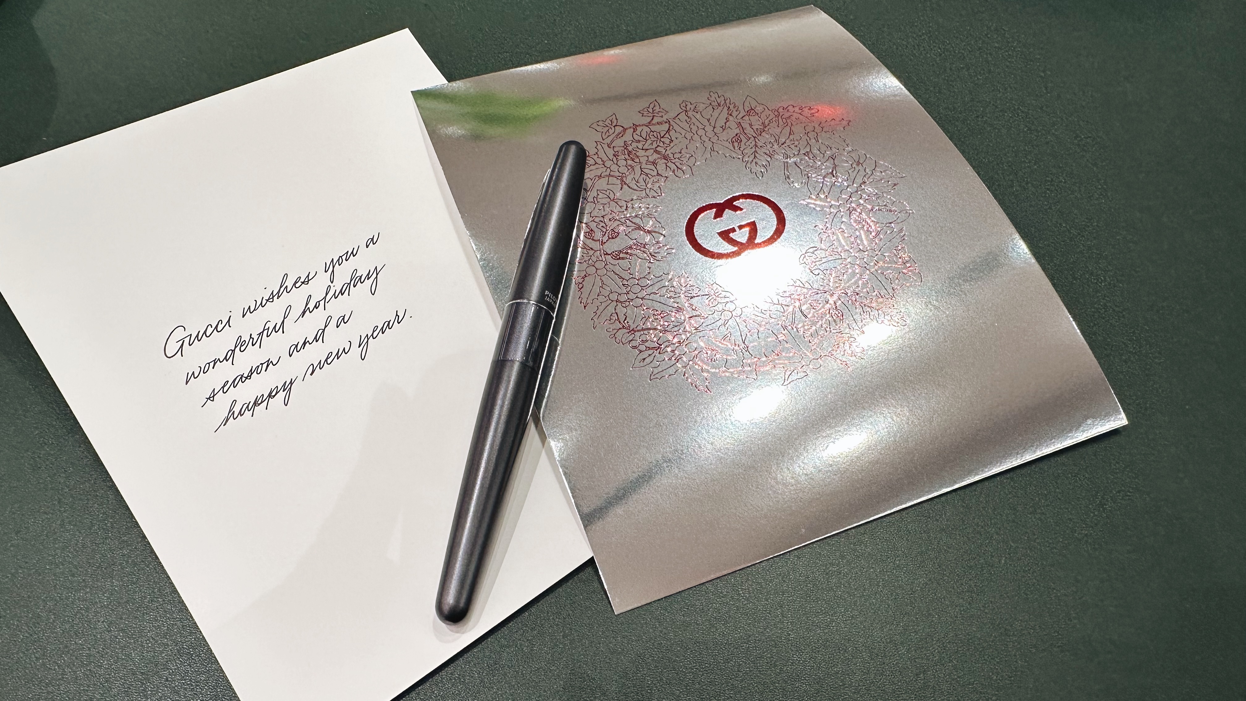 Holiday cards and wax seals at Gucci